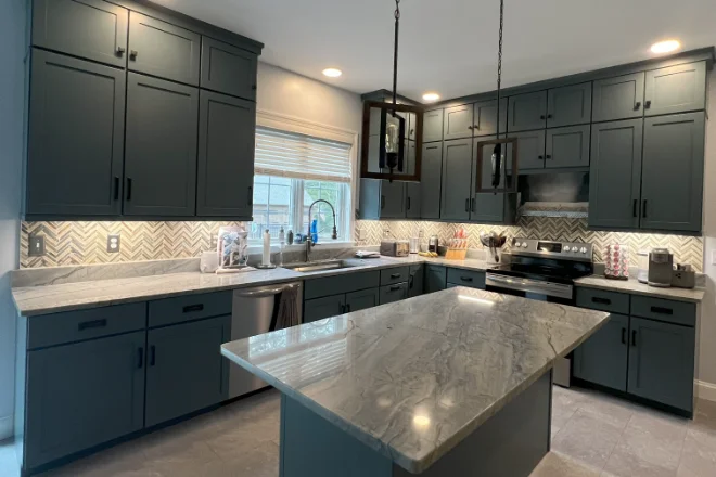 Cabinet painting services for a modern kitchen renovation.
